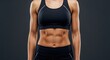 © Angelo - Fitness action woman showcasing defined abs in studio setting fitness photography dramatic lighting