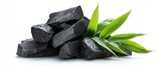 The charcoal pieces with fresh bamboo leaves arranged beautifully.