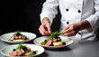 © Yasin - A skilled chef delicately garnishes a gourmet meal with precision and care.
