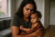 © Sarbinaz Mustafina - Indigenous woman holds her baby with cultural markings on her face. This heartfelt moment signifies deep cultural connection and care. Postpartum depression.
