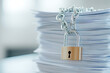 © A2Z AI  - Secured Documents: A high stack of paperwork is bound by a metal chain and padlock, symbolizing information security and data protection concepts.