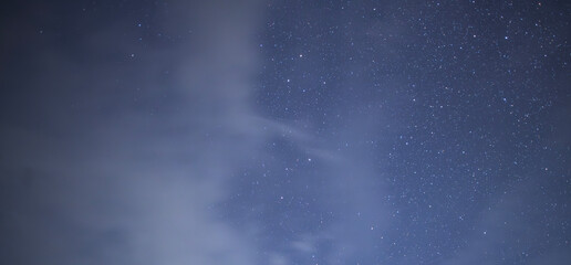 Canvas Print - beautiful night sky background, with long exposure clouds, starry sky