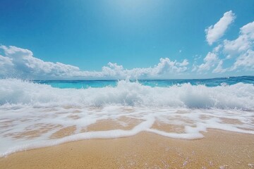 Wall Mural - Slow motion wave breaks on pristine sandy beach under bright blue sky, Slow motion wave breaks on perfect sandy beach Blue sky over ocean horizon