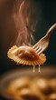© Olga - Delicious hot ravioli on fork with steam rising in cozy kitchen setting