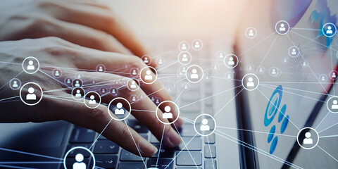 Business people using laptops in office and people network concept