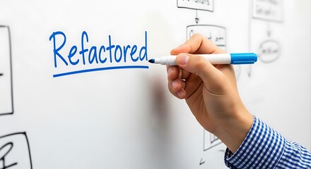 hand writing refactored on whiteboard with blue marker image