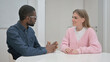 © stockbakers - Happy Creative People Talking while Sitting in Meeting