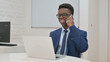 © stockbakers - Young African Businessman on a Phone Call