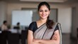 © Niks Ads - indian woman in saree standing confidently at office
