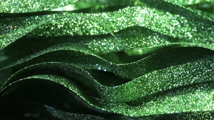 Wall Mural - luxurious green ribbons glittering and waving smoothly, creating elegant festive atmosphere with vib