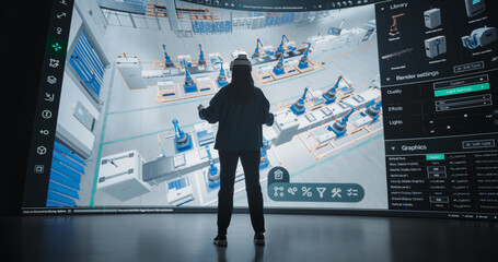 robotics specialist programs a group of robotic arms with the help of virtual reality metaverse. spe