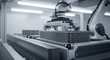 © Bakha - Automated robotic arm arranges thin metal sheets for industrial processing in modern manufacturing facility with advanced precision technology