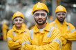 © Mohdfaridzazhar - Group of Indian workers wearing uniforms and safety goggles in a chemical processing plant, industrial safety in focus,