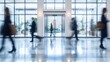 © Adriyanca - Blurred motion of business people in a modern office lobby