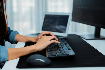 Wall Mural - cropped hands image of it developer creating with typing information on pc with coding program infor