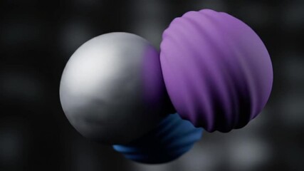 Abstract spheres merging with dynamic color shifts in a minimalist animation