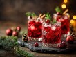 © Obsidian - Three festive cranberry cocktails are arranged in a cut glass, garnished with rosemary sprigs and fresh cranberries, set against a dark wooden background with subtle bokeh lights.