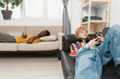 © SHOTPRIME STUDIO - Young adult man and woman relaxing after work, socializing as colleagues and friends in a casual modern workplace setting, representing Gen Z business culture and working lifestyle.