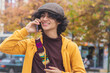 © tetxu - casual young man talking on mobile phone on the street in autumn