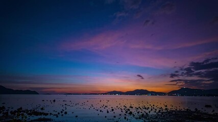 Wall Mural - time lapse amazing cloud in colorful sky of sunset above the ocean. landscape amazing light of natur