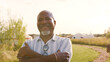 © Monkey Business - Portrait Of Smiling Mature Man Visiting Yurt Campsite In Countryside