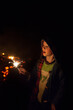 © Austockphoto - Young boy with a sparkler on a winter bonfire night