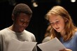© Oleksandr - Script Play. Teenage Boy and Girl Reading and Acting the Script Together in Theatre Club Class