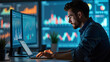 © Konstantin - Individually engaged in focused work on a laptop in a contemporary office filled with dynamic data visualizations, analyzing graphs and information