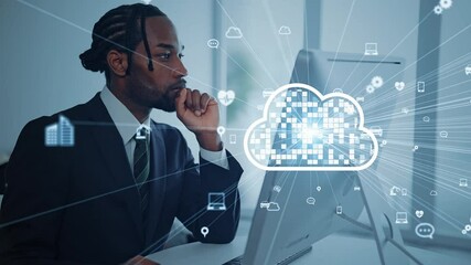 Black man working on a computer and cloud computing concept