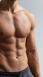 © Vilma - Athletic man with defined abdominal muscles posing, bodybuilder's torso in fitness concept