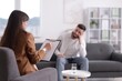 © New Africa - Professional psychologist working with patient in office, selective focus