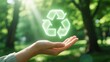 © designartwork28 - Glowing Green Recycle Symbol Held in Open Hand, Eco-Friendly Concept, Sustainable Future, Recycle Green Background.