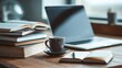 © Alena - Cozy home workspace with laptop, books, and coffee on wooden table in soft focus. Modern laptop open to popular online learning platforms