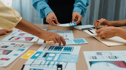 Wall Mural - panorama video of startup company employee planning on user interface prototype for mobile applicati