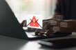 © THAWEERAT - Phishing email warning alert on laptop screen with hands typing, concept of cyber scam, digital fraud, and online security threat, scam emails, hacking, and online security risks in cyberspace.