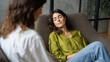 © TrappedMorghulis - Therapy Session Between a Young Woman and Her Counselor