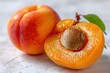 © Mashita - Freshly Cut Apricot on Marbled Surface with Natural Lighting, Highlighting Juicy Flesh, Seed, and Leaf, Perfect for Summer Recipes and Healthy Eating Concepts