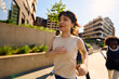 © Boris Jovanovic/Stocksy - Active individuals are running in town