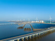 © ma yic/Stocksy - Offshore Solar Panels and Wind Turbines