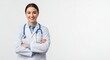 © syukri - young adult doctor wearing lab coat with faint smile, arms crossed, standing proudly. Isolated subject without props or text.