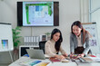 © Pichsakul - Asian Interior Designers Teamwork on Color Palette Selection for Home Renovation Project | Professional Architect Meeting and Discussing on Interior Design Project Plan