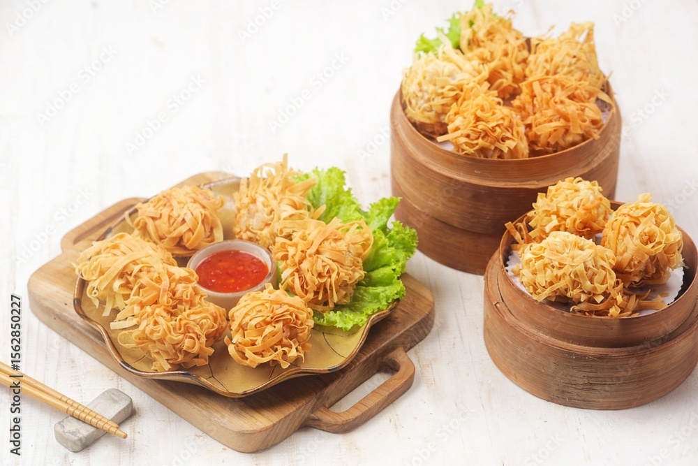 Dim Sum Rambutan Udang Rambutan. Rambutan Shrimp is a type of fried dimsum, ball-shaped ...