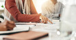 © LuxeShutter25/peopleimages.com - Hands, business people and team planning with paperwork in meeting for accounting strategy. Group, document or financial discussion in office for bookkeeping, audit or brainstorming for budget review