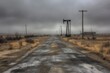 © Choli - Empty road through a desolate oil field on a foggy day.