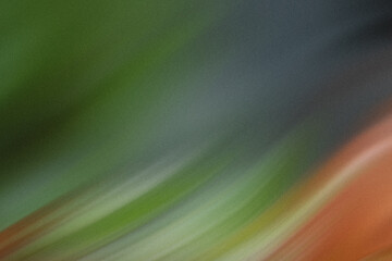 Wall Mural - abstract diagonal streaks of green, orange, and gray create a blurred and textured background with a