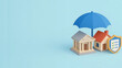 © AiDesign - Blue umbrella covering small house and bank with shield icon representing financial safety, home security, protection from risk, and banking support for loan and insurance concept