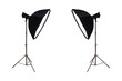 © Pornprasit Panada - Studio flash with softbox on stainless steel tripod isolated.