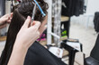 © Austockphoto - Teenager getting her hair cut at the hairdresser