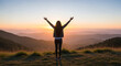 © Ediane - A person stands with arms outstretched, enjoying the stunning landscape and sunset.