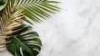 © tonifrito - Tropical golden and green leaves on white marble background